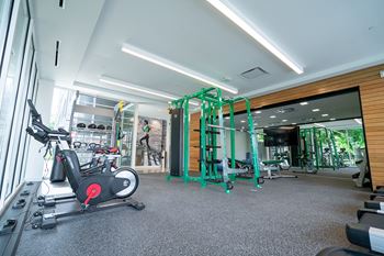 Unlimited fitness center with cardio, strength training and free weights